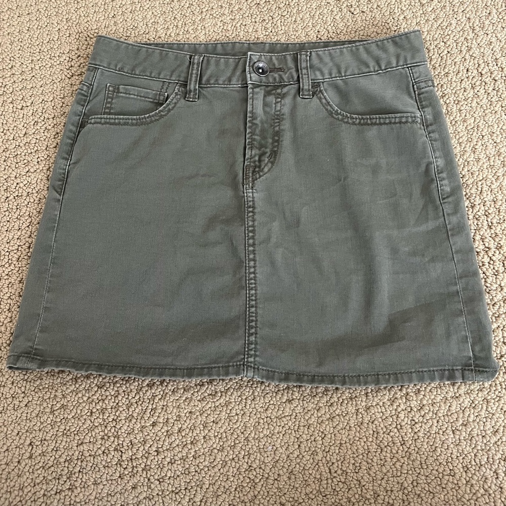 Dark green mini skirt